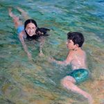 Niños jugando en el mar de Jávea