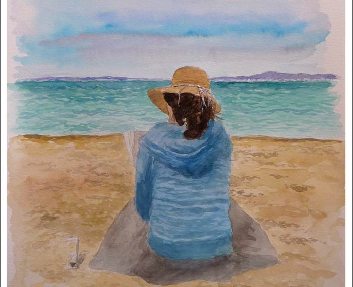 Acuarela de un retrato de una mujer leyendo en una playa pintado en acuarela por Rubén de Luis